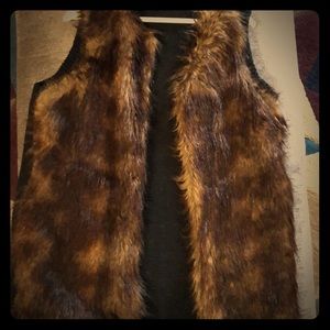 Blacks and brown fur vest